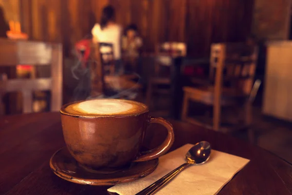 Cup of coffee on table — Stock Photo, Image