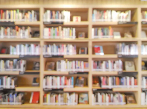 Blurred bookshelf in library room — Stock Photo, Image