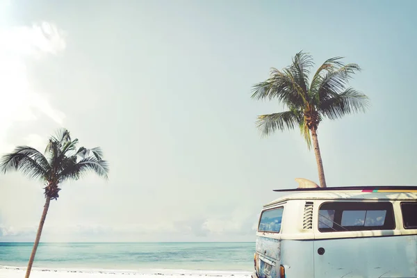 Vintage car parked on the tropical beach