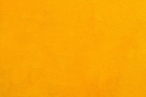 Betonnen muur oude gele kleur — Stockfoto