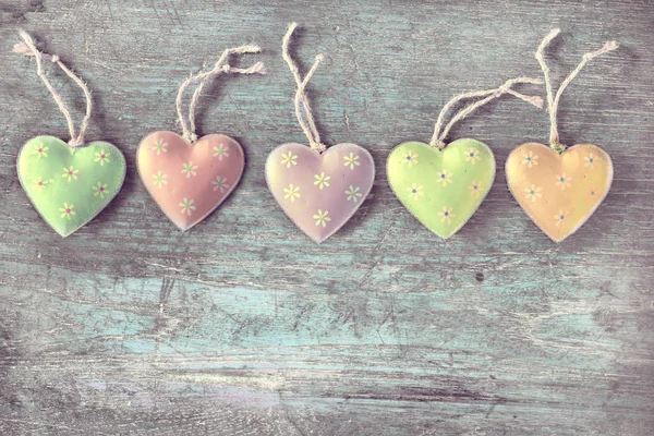 Cute hearts on wood table — Stock Photo, Image