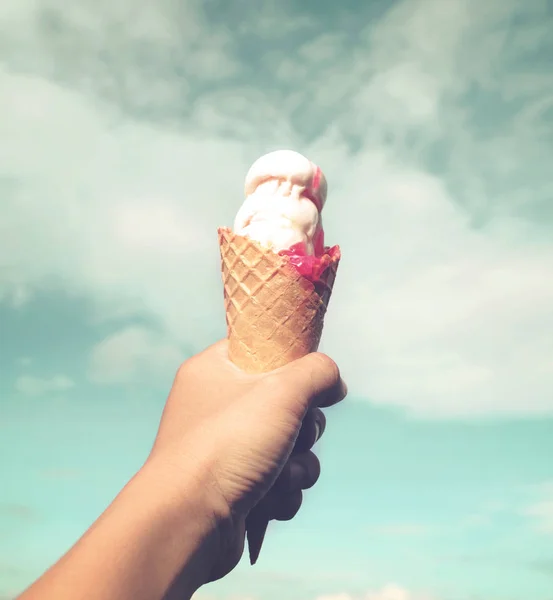 girl hand holding ice cream