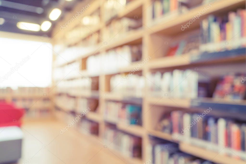 blurred bookshelf in library room