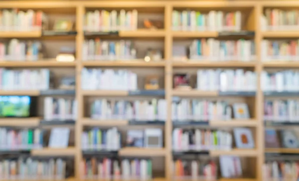 Blurred bookshelf in library room — Stock Photo, Image