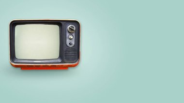 Retro televizyon - eski renk arka plan üzerinde tv. Retro teknoloji. düz yatıyordu, en iyi görünümü kahraman başlığı. Vintage renk stilleri. 