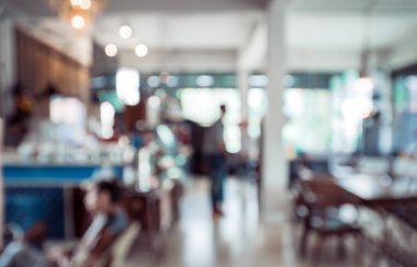 Coffee shop arka plan bulanık görüntü. kafede insanlarla arka plan bulanıklık. Vintage renk tonu stili