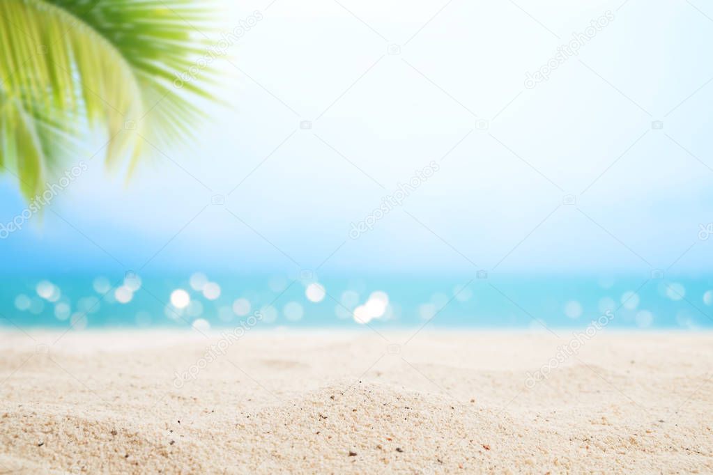 A seascape tropical beach. blur and bokeh light of seascape background, vintage color style. Focus on foreground.