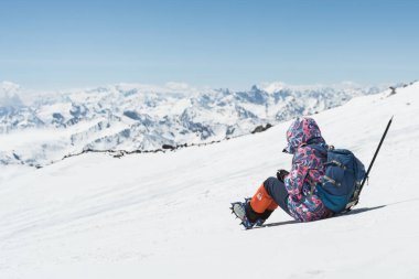 Caucasus / Russia - 12.04.2018 Group of climbers climbing mountain peaks.