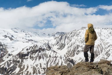 Caucasus / Russia - 22.04.2018 Group of climbers climbing mountain peaks.