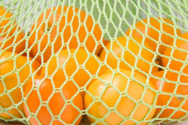 Portakallı yeşil ip torbası. Ekoloji. Çevre koruma. ekolojik paket.