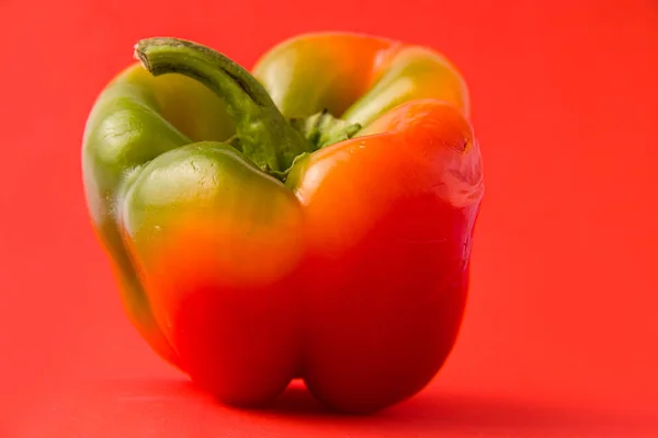 ugly products, vegetables on a colored background. Sweet pepper.