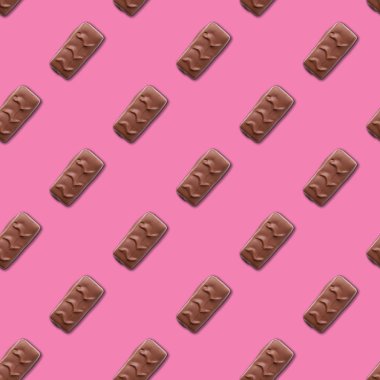Pembe arka planda çikolata. Kusursuz desen. Arkaplan resmi