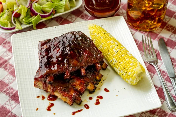 Barbeque racks of ribs with sauce — Stock Photo, Image