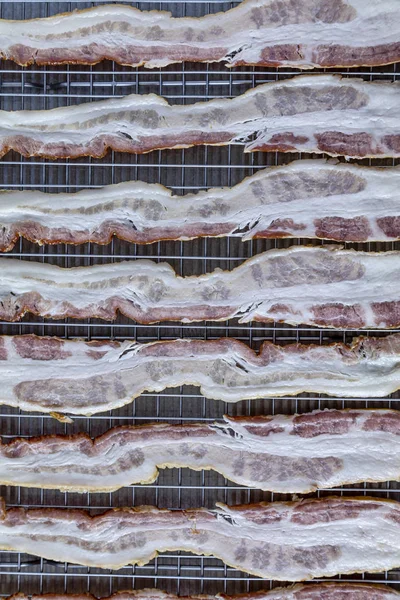 Hickory smoked bacon cooked in the oven — Stock Photo, Image