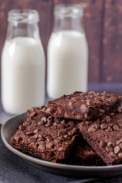 Gray Plate Stacked Homemade Keto Chocolate Chip Brownies Two Bottles — Stock Photo, Image