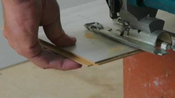 Jig saw to cut laminate — Stock Footage Jig saw to cut laminate Stock Footage