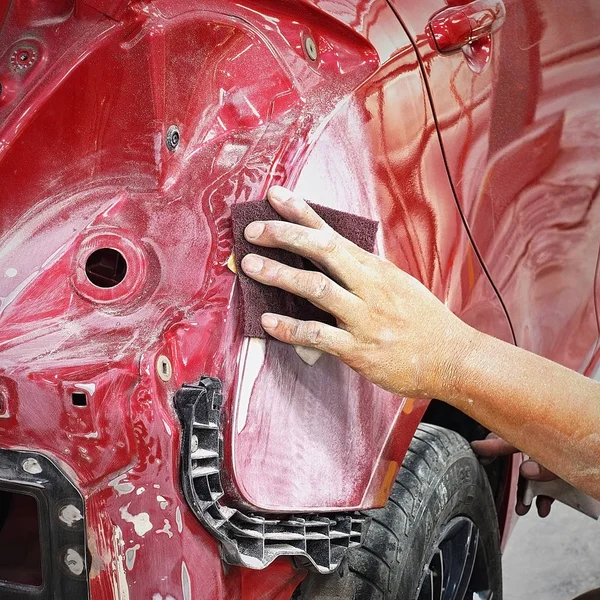 Car body work auto Repair paint after the accident. Stock Photo by