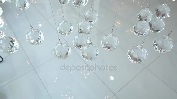 Crystals closeup. Crystal modern chandelier detail background. Hanging diamonds with blinking shining reflection. Slow motion 240 fps. High speed camera shot. Full HD 1080p — Stock Video