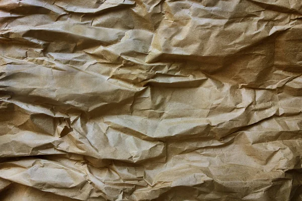 皱巴巴的褐色牛皮纸背景 — 图库照片