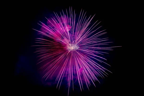 Magenta Sparkling Fireworks Background on Night Scene — стокове фото