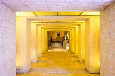 Straight walkway with stone and marble decoration