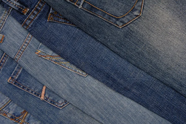 Pilha de jeans diferentes, lado de trás — Fotografia de Stock
