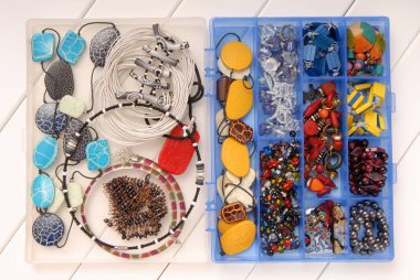 assortment of female accessories, bijouterie is in box, beads, e clipart