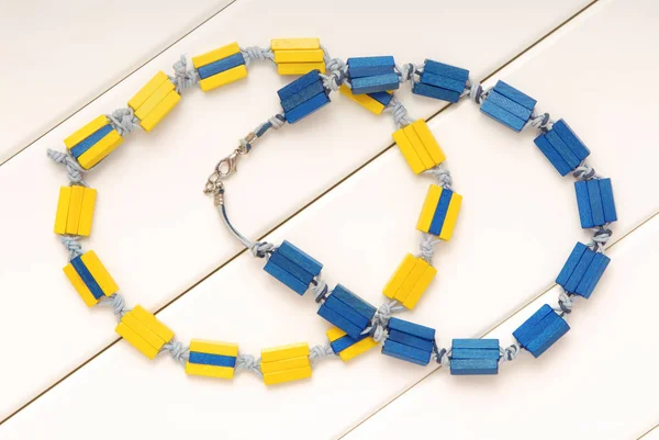 Yellow and blue bijouterie, plastic beads, unisex necklaces, mod — Stock Photo, Image