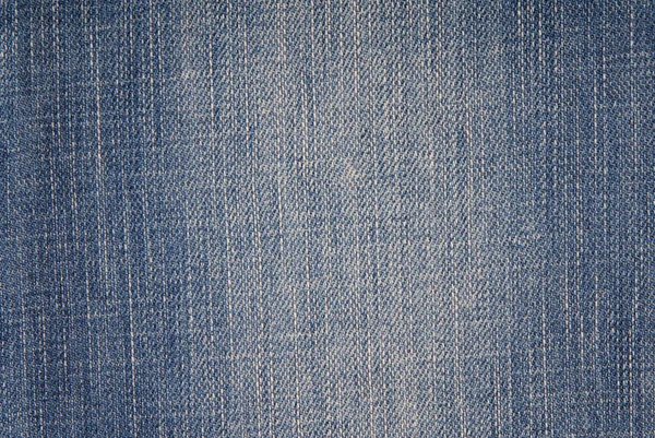 Fundo jeans azul, tecido jeans, close-up de jeans — Fotografia de Stock