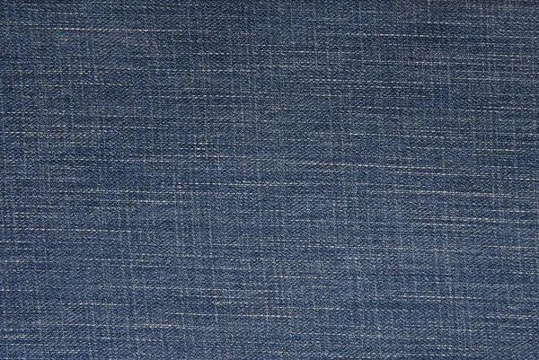 Fundo azul denim, tecido jeans, close-up de jeans têxtil — Fotografia de Stock