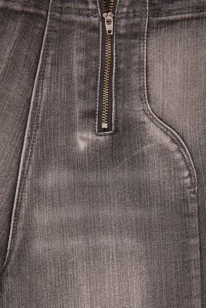Fondos de mezclilla gris, primer plano de los pantalones vaqueros, pantalones de moda — Foto de Stock