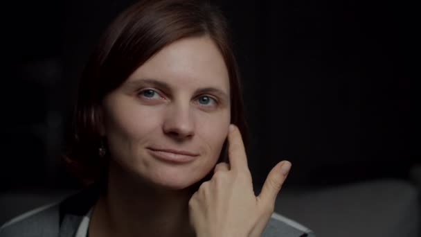 Beautiful confident brunette woman smiling and touching face skin at camera. Pretty female close up front portrait. — 비디오