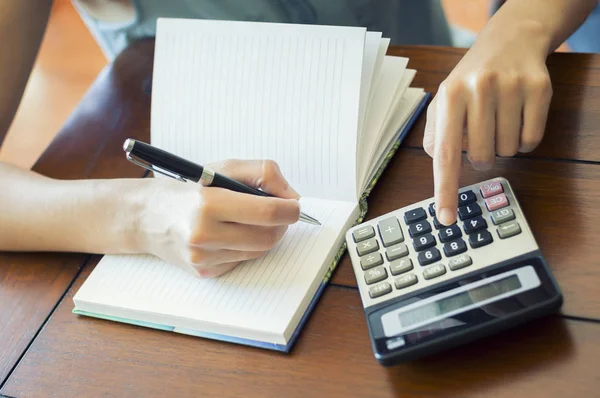 Accountant Working With Calculator