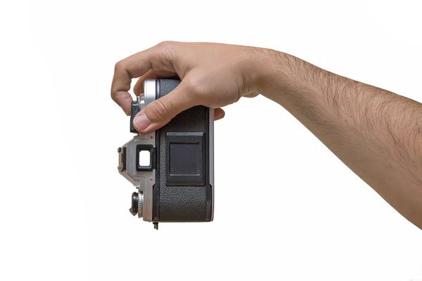 Mão segurando câmera analógica isolada em fundo branco — Fotografia de Stock