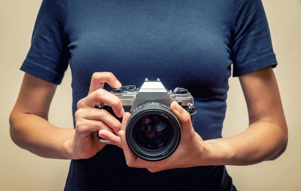 Woman Holding A Vintage Camera