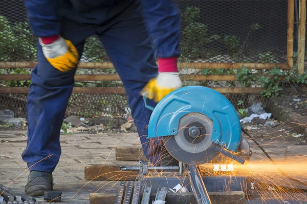 Man Cutting Steel With Metal Grinder — Stock Photo, Image