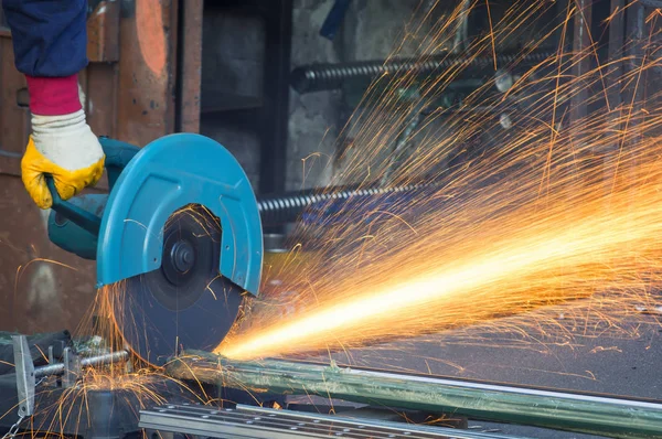 Cutting Steel With Metal Grinder Stock Photo