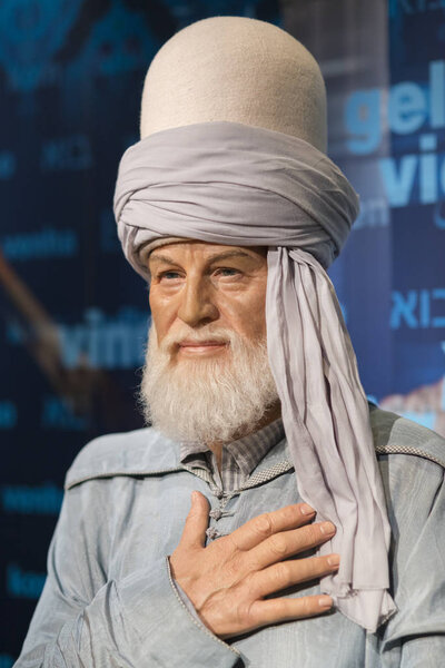ISTANBUL, TURKEY, DECEMBER 19, 2017: Wax sculpture of Mevlana at Madame Tussauds Istanbul. Mevlana was a 13th-century Persian, Sunni Muslim poet, jurist, Islamic scholar, theologian and Sufi mystic.