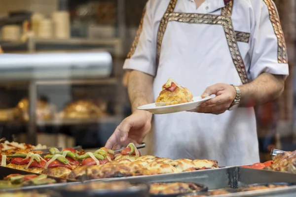 Chef Serving Food At A Traditional Turkish Restaurant