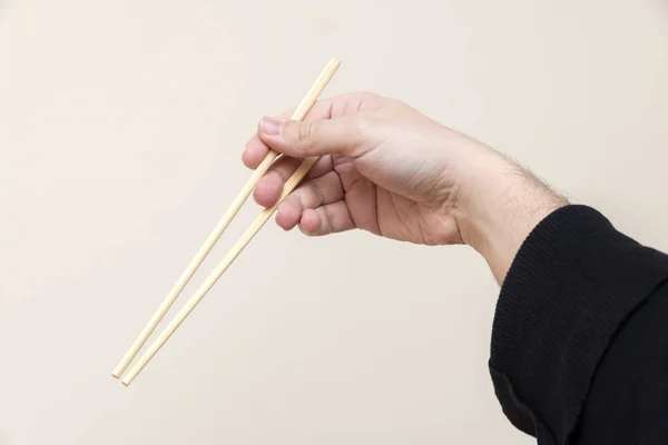 Male Hand Holding Chopsticks — Stock Photo, Image