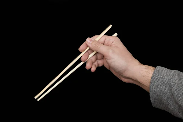 Hand Holding Chopsticks Isolated Black Background — Stock Photo, Image