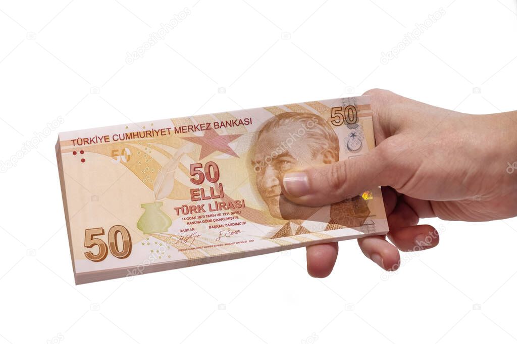 Female Hand Holding 50 Turkish Lira Banknotes, Isolated On White Background