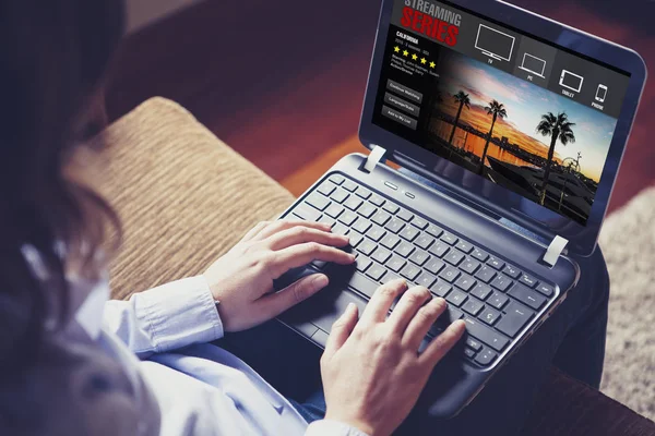 Woman watching streaming series in a laptop computer at home. — Stock Photo, Image