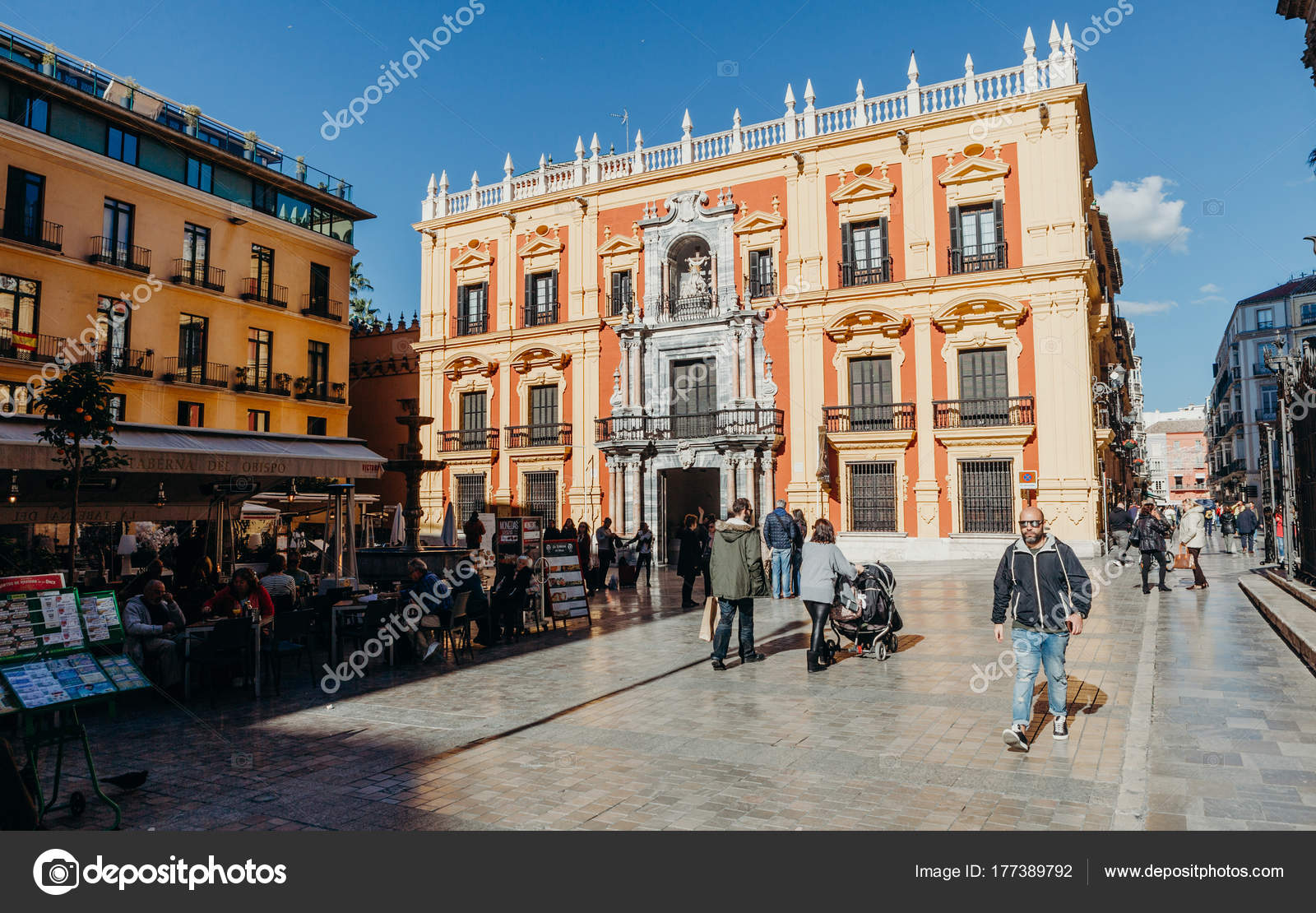 MALAGA, SPAIN DECEMBER 5th, 2017 Episcopal palace facade and tourist
