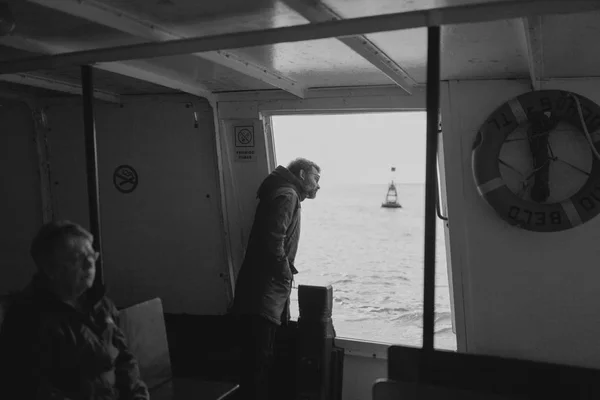 MARCH 24th, 2018 - OLHAO, PORTUGAL: Inside view of the public boat that connect the portuguese city of Olhao with Armona Island, during a regular trip with passengers traveling inside it, on March 24th, 2018. — Stock Photo, Image