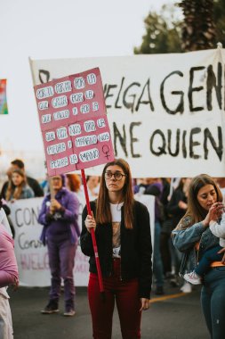 MALAGA, SPAIN - MARCH 8 th, 2020: Woman showing feminist banner during feminist strike in Malaga, Spain, on March 8 th, 2020.