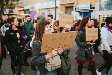 MALAGA, SPAIN - MARCH 8 th, 2020: Woman showing feminist banners during feminist strike in Malaga, Spain, on March 8 th, 2020.