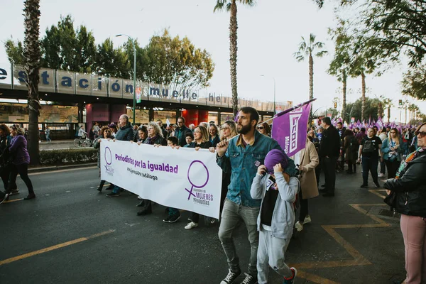 stock image MALAGA, SPAIN - MARCH 8 th, 2020: People celebrating 8m woman day with banners and placards, during feminist strike in Malaga, Spain, on March 8 th, 2020.