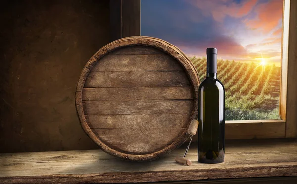White wine with barrel on vineyard in Chianti, Tuscany, Italy