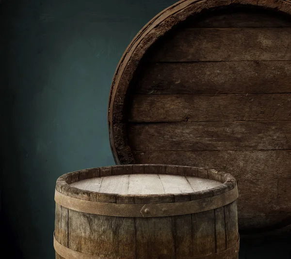 Beer barrel on table on wooden background — Stock Photo, Image